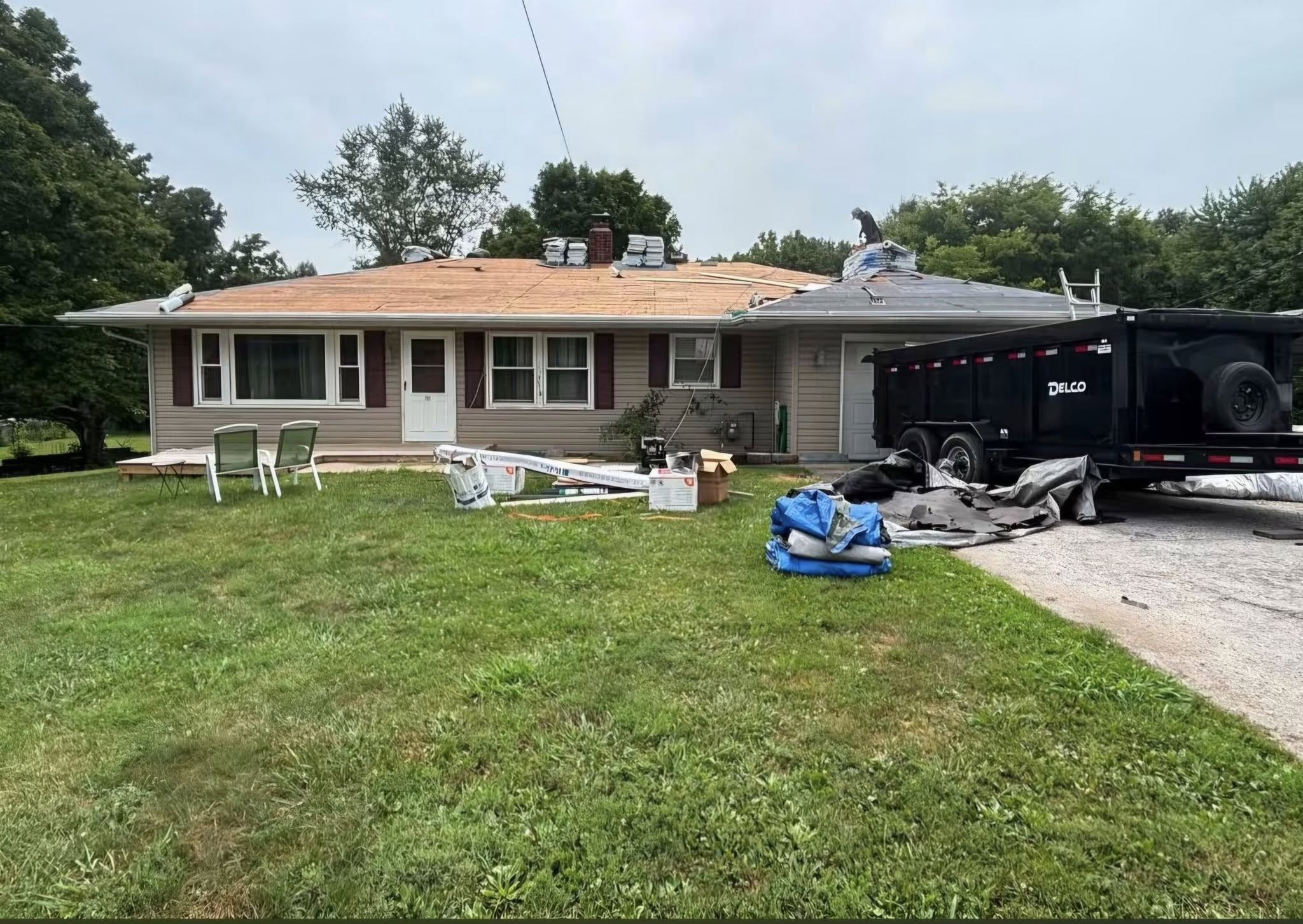 Roof tear-off during storm damage restoration Salem IL